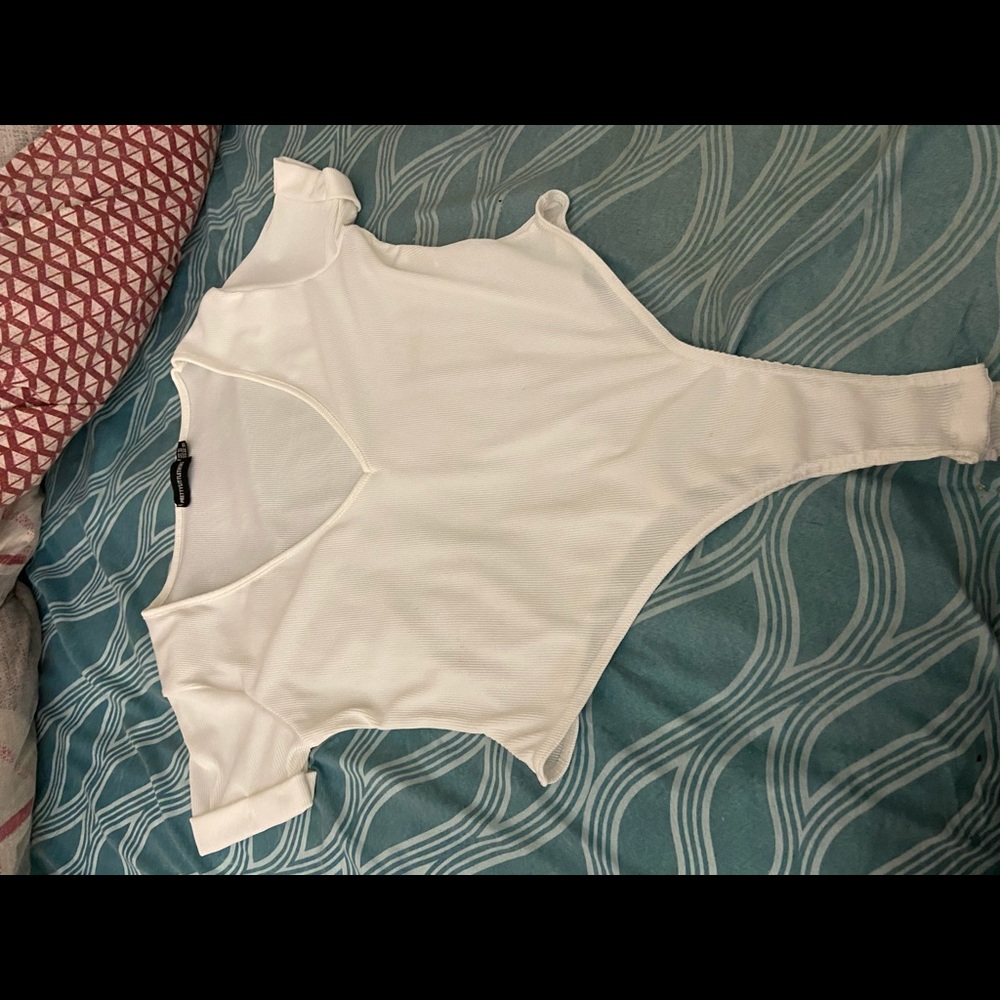 White shirt,with folded arm